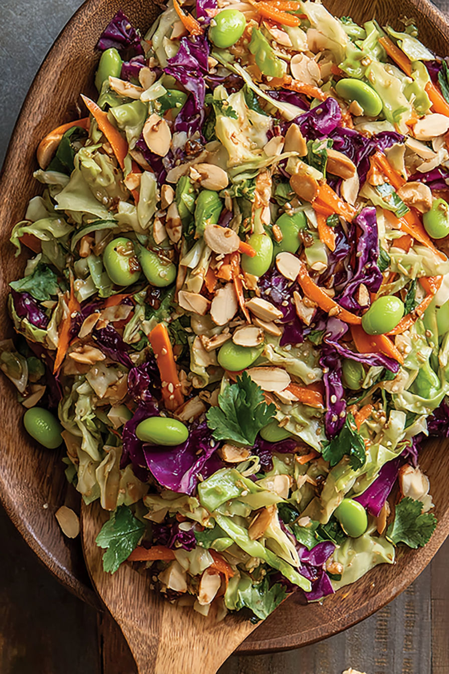 A salad with crunchy cabbage and edamame.