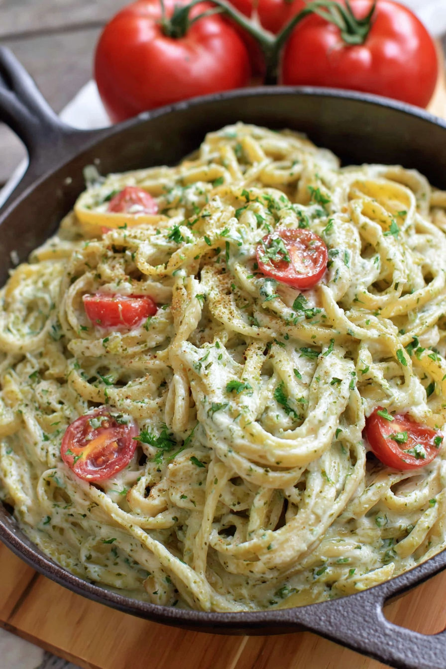 A bowl of creamy pesto pasta.