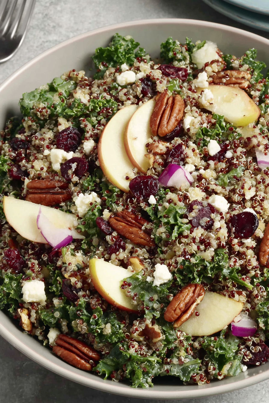 A bowl of a cranberry apple quinoa salad.