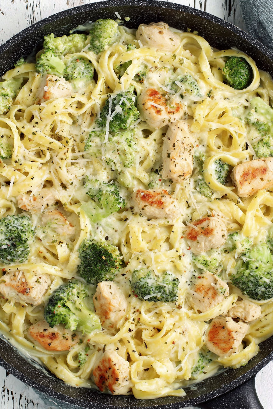 A dish of chicken and broccoli with pasta.