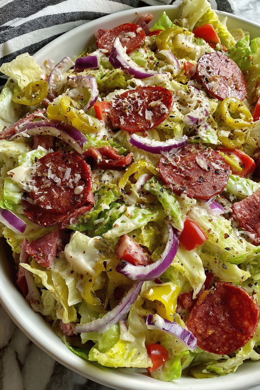 A salad with meat and vegetables.