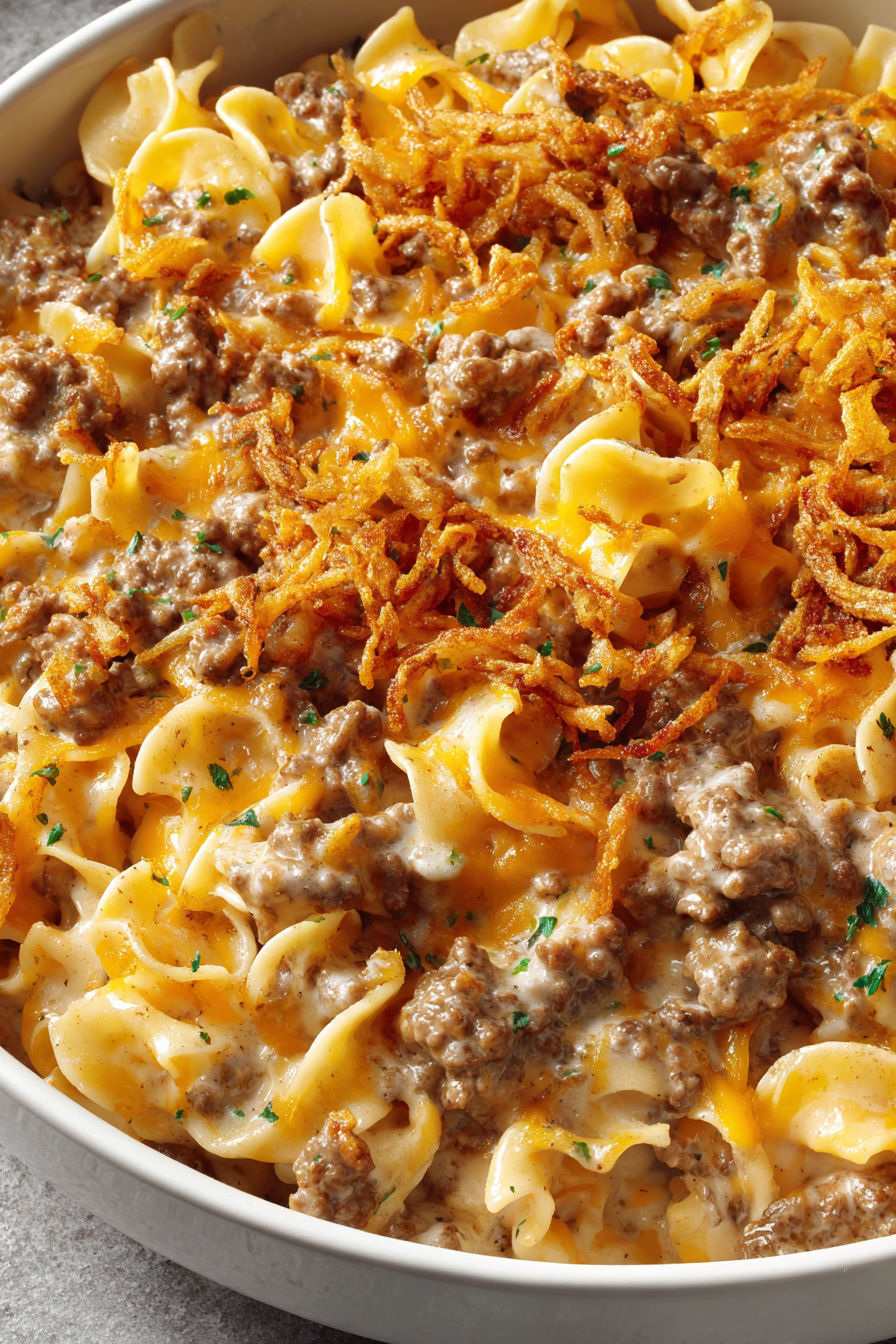 A delicious cheesy beef and noodle casserole with crispy french onions.