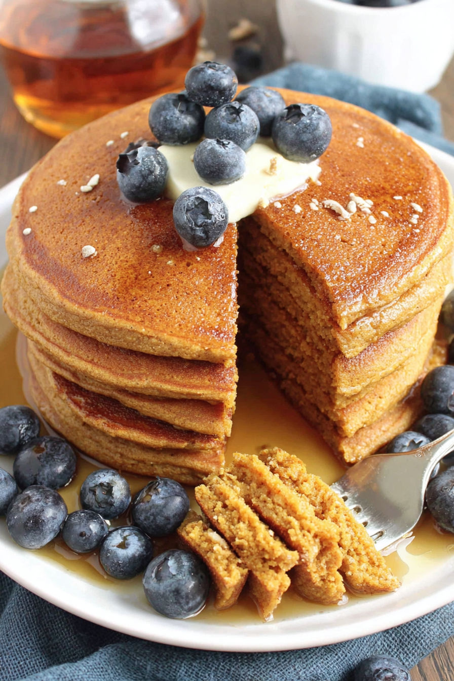 A stack of gluten free sweet potato pancakes.
