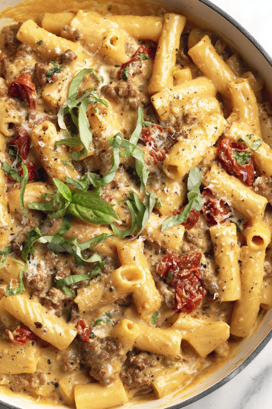 A delicious pasta dish with Italian sausage and tomatoes.