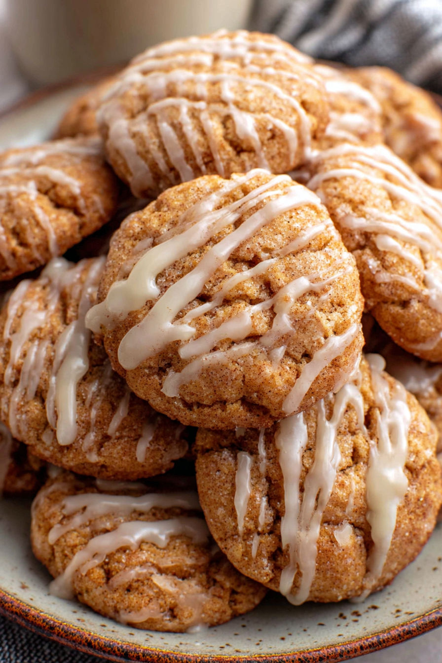 A plate of cookies with icing.