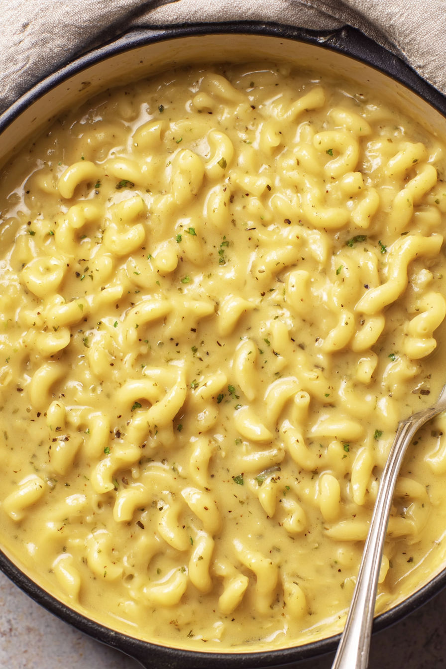 A bowl of mac and cheese soup.
