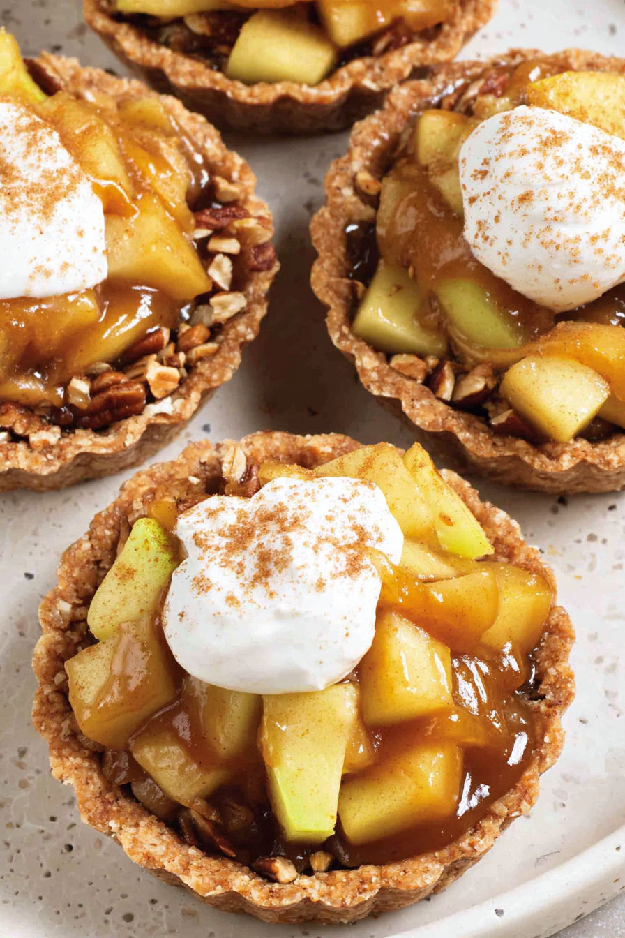 A dessert with a dollop of whipped cream on top.