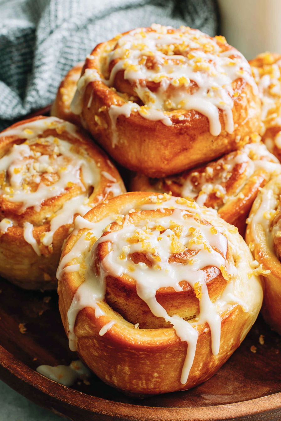 A plate of orange rolls.