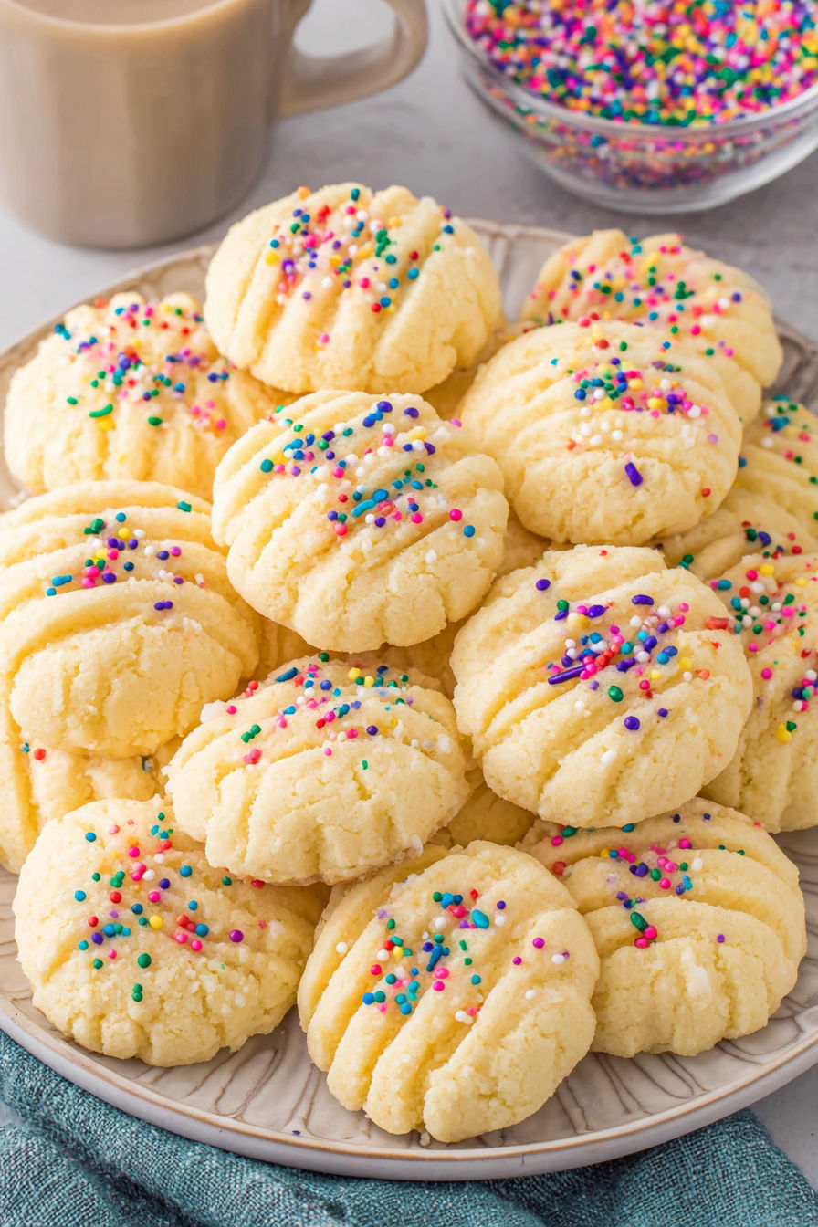 A plate of whipped shortbread cookies.