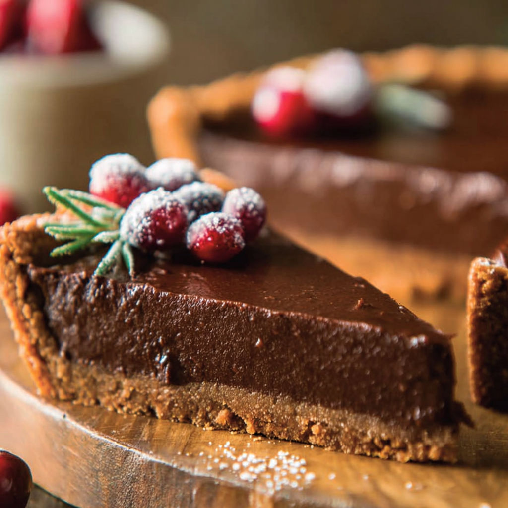 A slice of chocolate gingerbread tart.