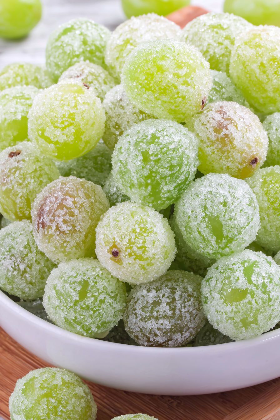 A bowl of frozen grapes.