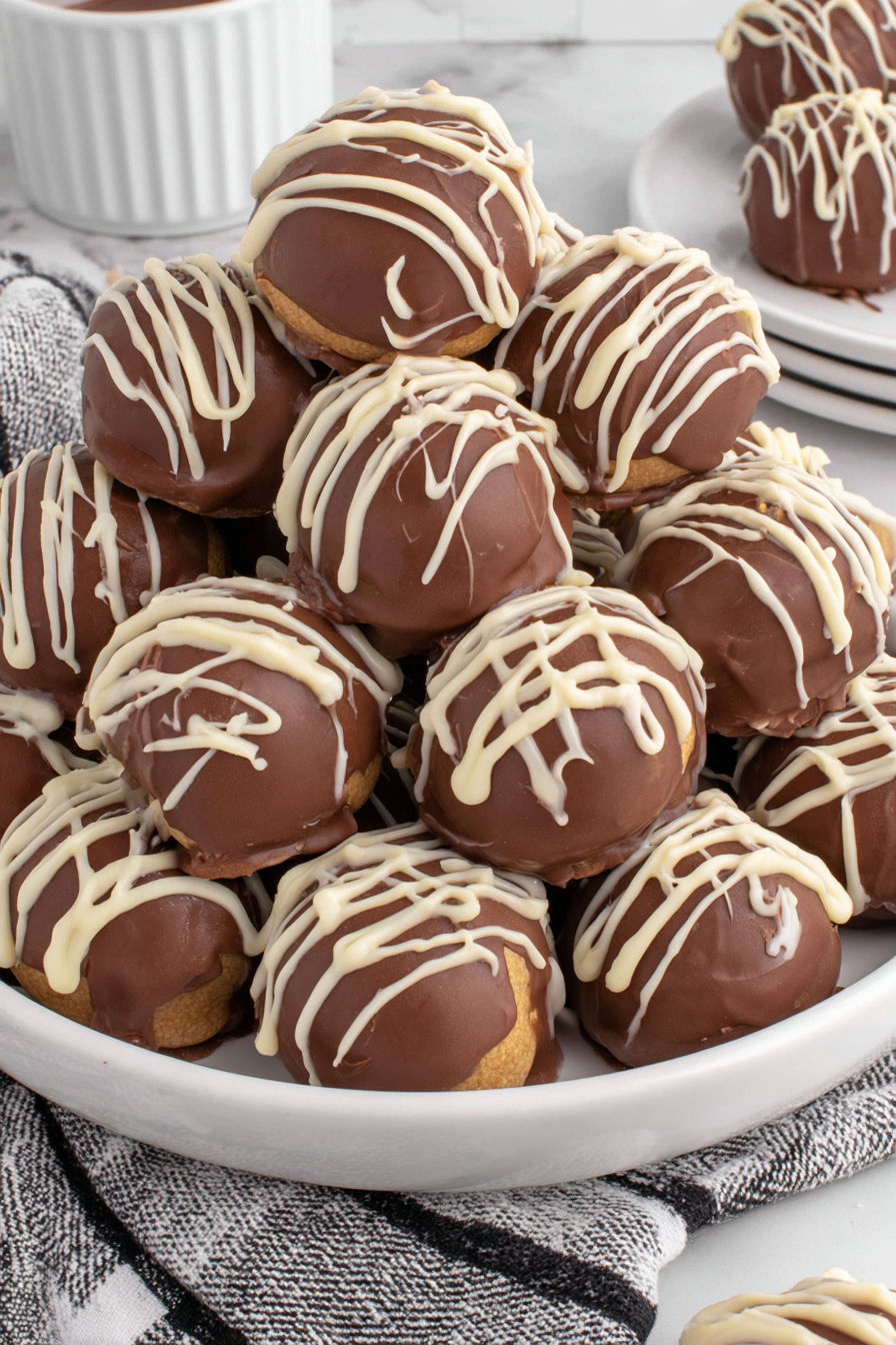 A plate of chocolate covered Kahlua balls.