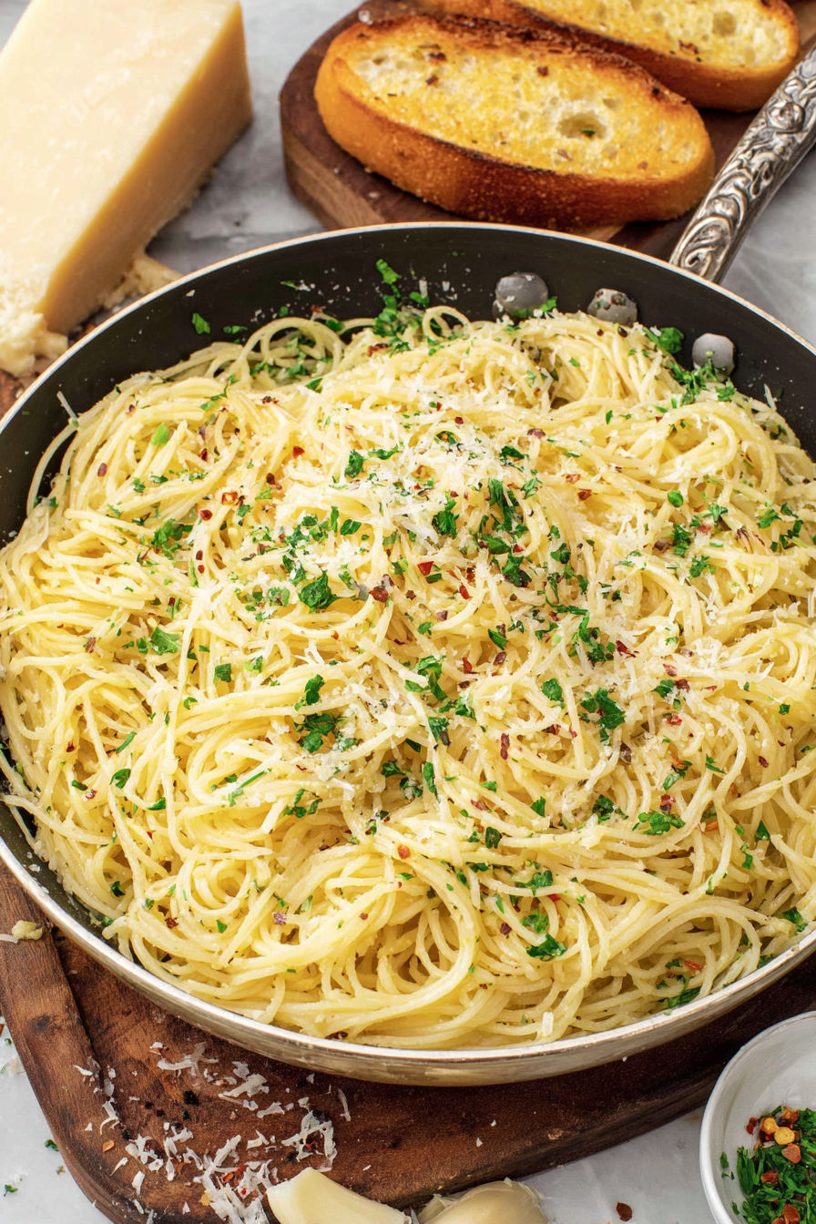 A pan of pasta with Parmesan cheese.