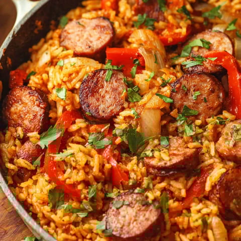 A dish of rice and sausage.