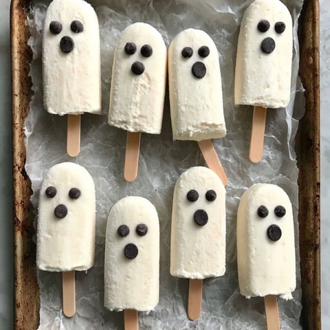 Boo-nana popsicles on a tray.