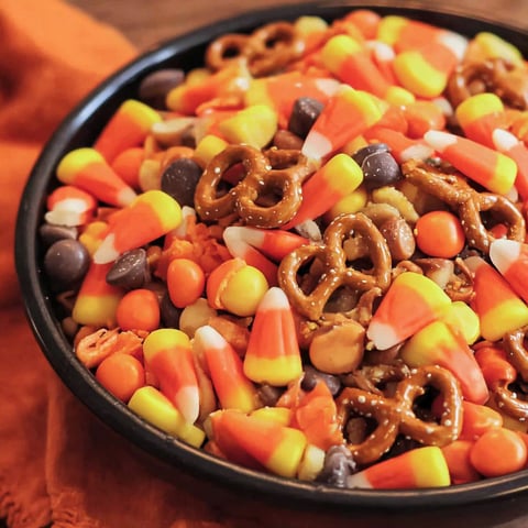 A bowl of candy corn mix.