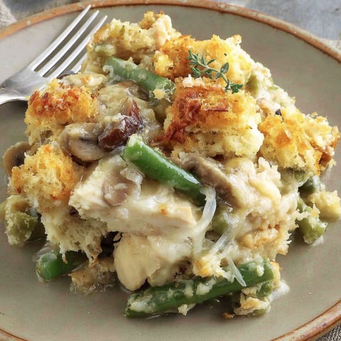 A plate of food with a fork on it.