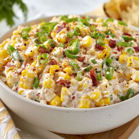 A bowl of Mexican street corn dip.