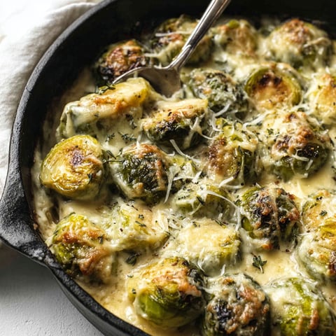 A close up of a dish of Brussels sprouts.
