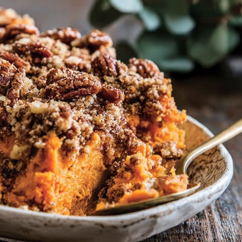 A close up of a sweet potato casserole.
