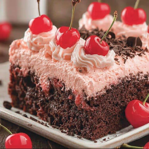 A slice of cherry dr pepper cake.