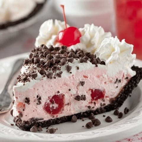 A slice of chocolate cherry pie.