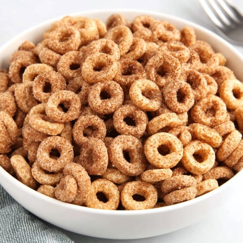 A bowl of mini donuts with butter.