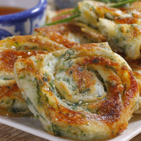 A plate of scallion pancakes.