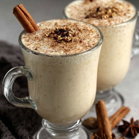 Two glasses of homemade eggnog.