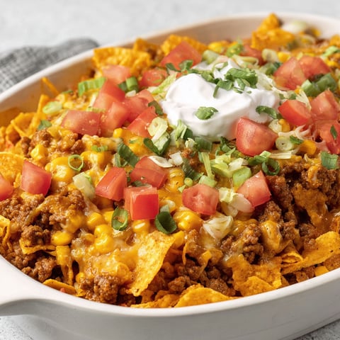 A white bowl filled with a delicious meal.